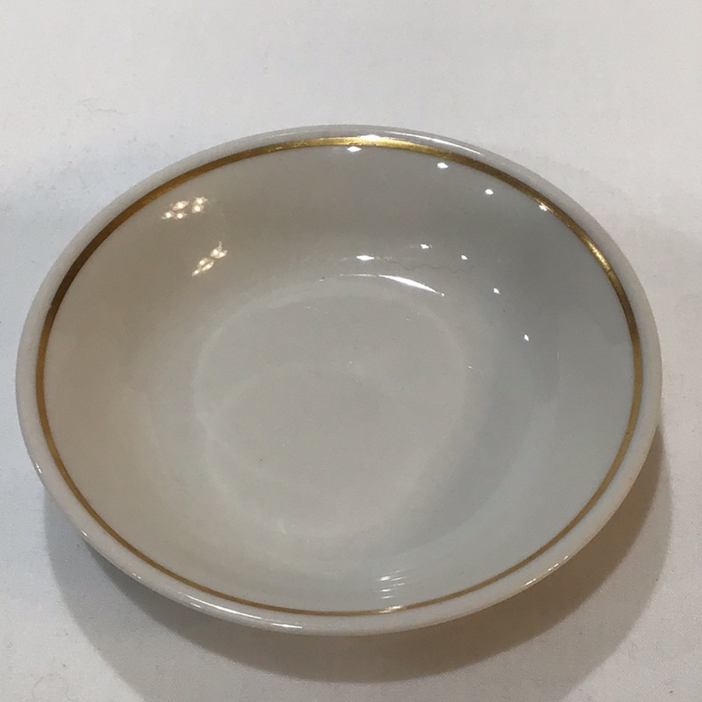 Monkey bowl trimmed in gold, Made in the Shenango Valley, Pennsylvania USA